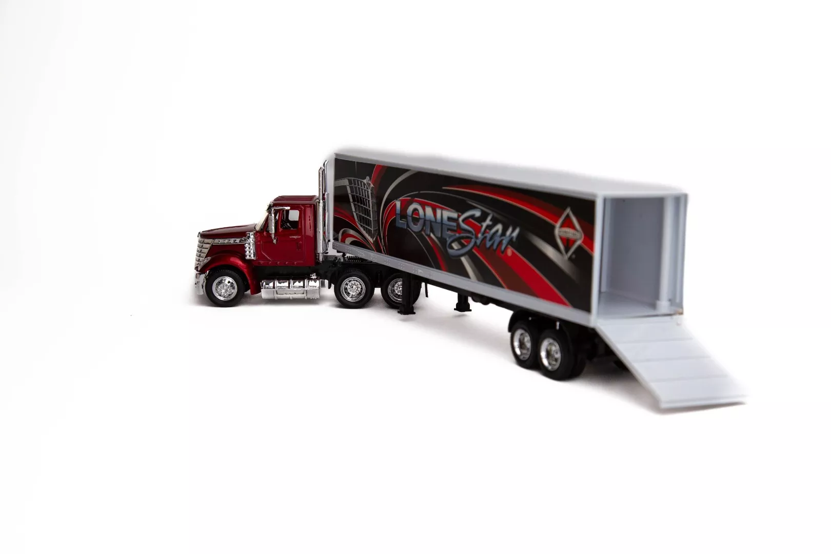 New Ray 1:43 Scale International Lonestar diecast toy with dry van trailer